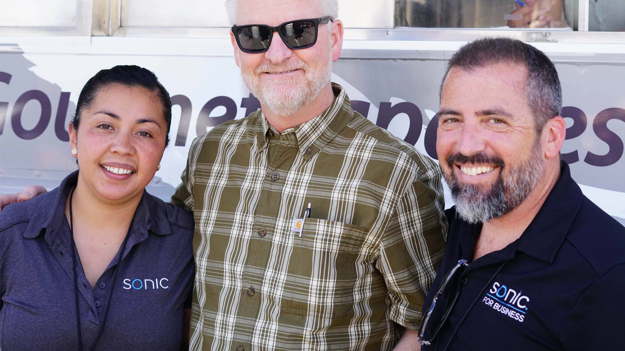 Sonic employees smiling together